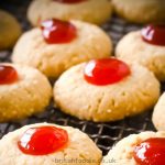 Mary Berry Melting moments with glace cherry and rolled in oatmeal