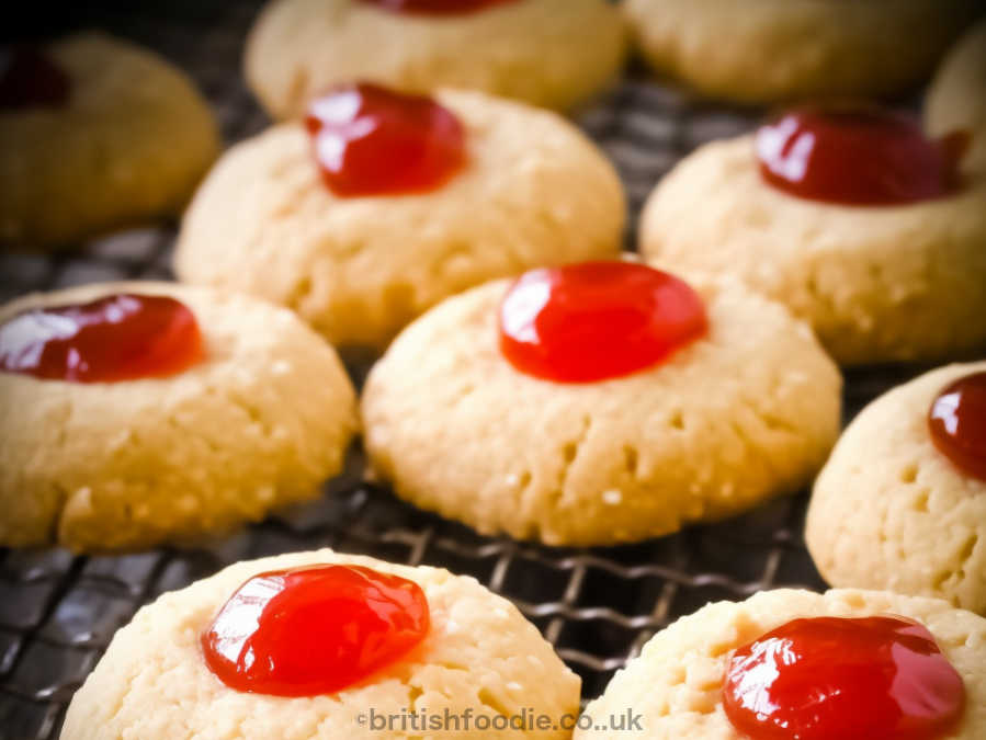 Mary Berry Melting moments with glace cherry and rolled in oatmeal