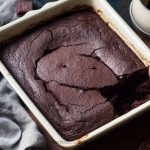 a rectangular baking pan with a chocolate fudge pudding