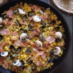 a pan with Welsh laverbread and cockles cooked with bacon