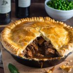 British steak and ale pie with peas on the side